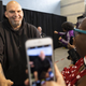 Pennsylvania Lt. Gov. John Fetterman, left, a Democratic candidate for U.S. Senate, greets supporters as he enters his event in Philadelphia, Saturday, Sept. 24, 2022. Black voters are at the center of an increasingly competitive battle in a race that could tilt control of the Senate between Fetterman and Republican Mehmet Oz, as Democrats try to harness outrage over the Supreme Court’s abortion decision and Republicans tap the national playbook to focus on rising crime in cities.